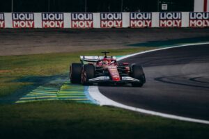 High-speed Formula 1 racing at Interlagos Circuit, São Paulo, Brazil.
